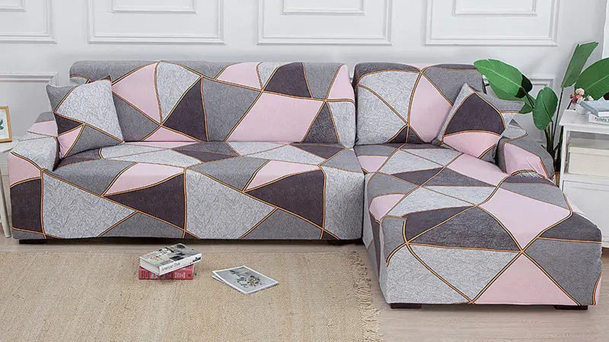 Sectional sofa covers fitted in two pieces on an L-shaped couch in a bright living room - French Covers